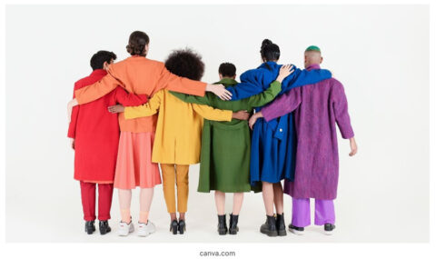 people wearing rainbow clothes for Pride